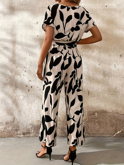 Nadine | Gemusterter Damen Jumpsuit mit Bindegürtel