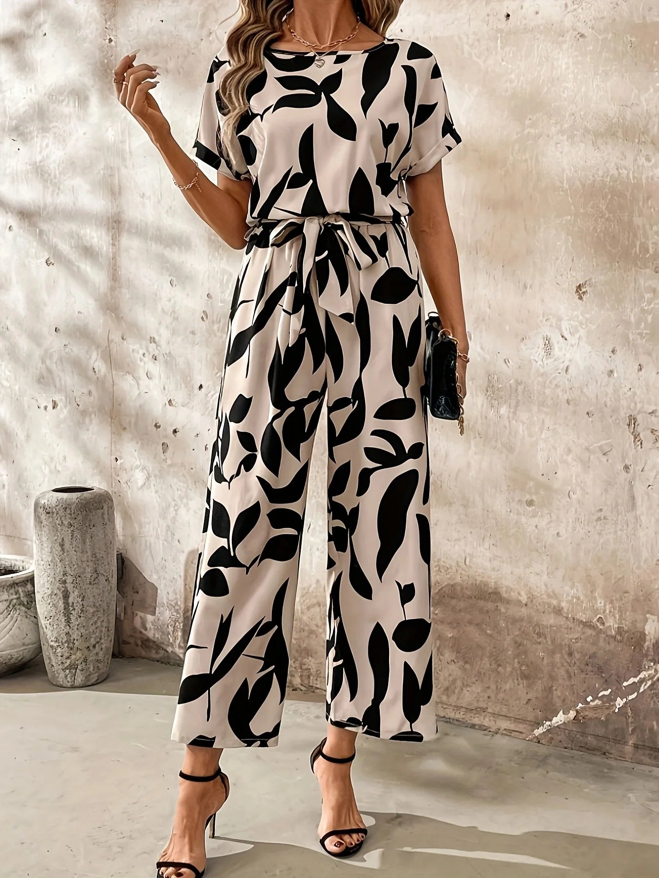 Nadine | Gemusterter Damen Jumpsuit mit Bindegürtel