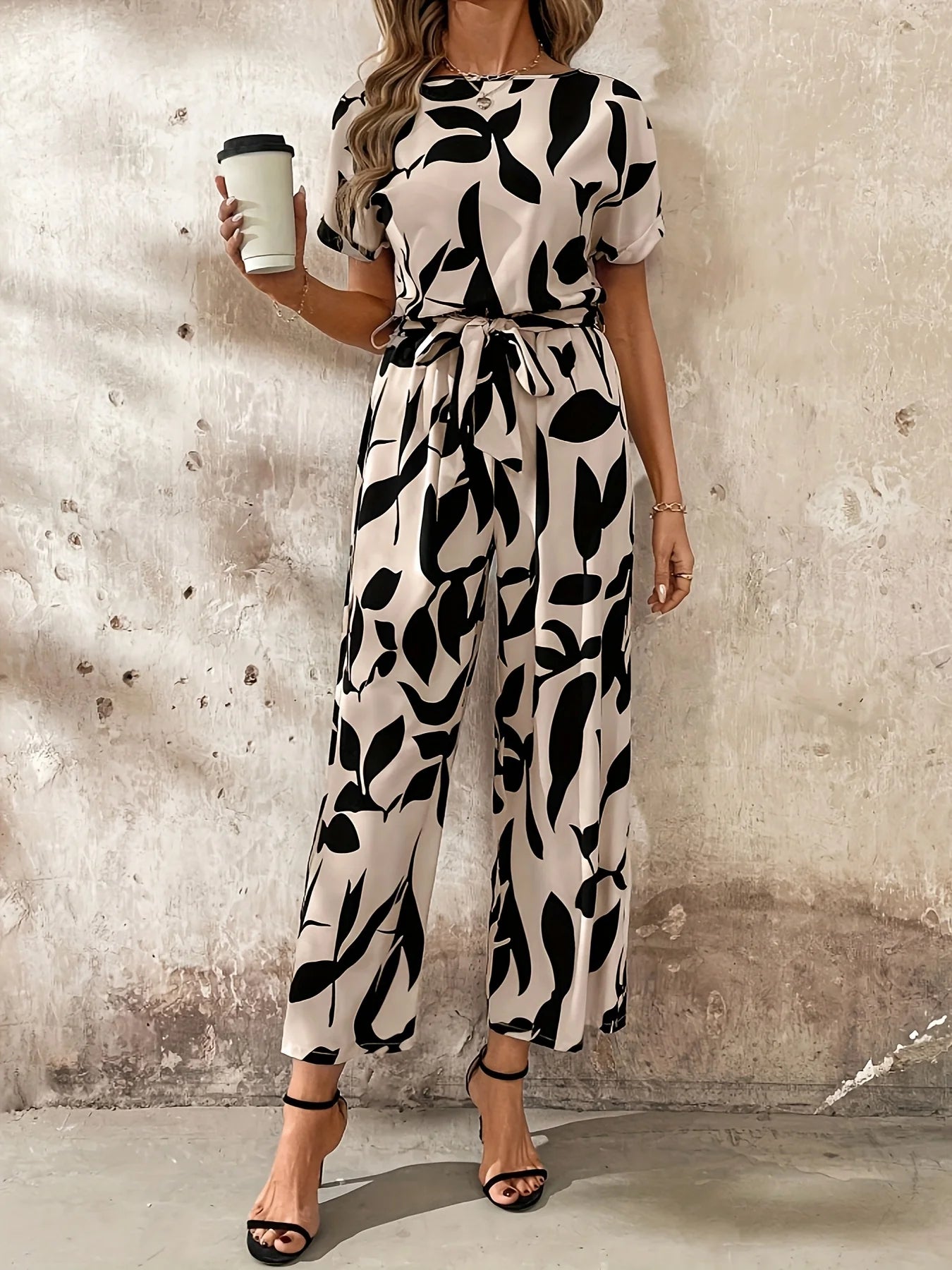 Nadine | Gemusterter Damen Jumpsuit mit Bindegürtel